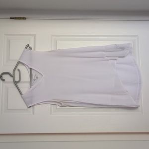 Classic sleeveless white tunic length summer top. Also fits M.